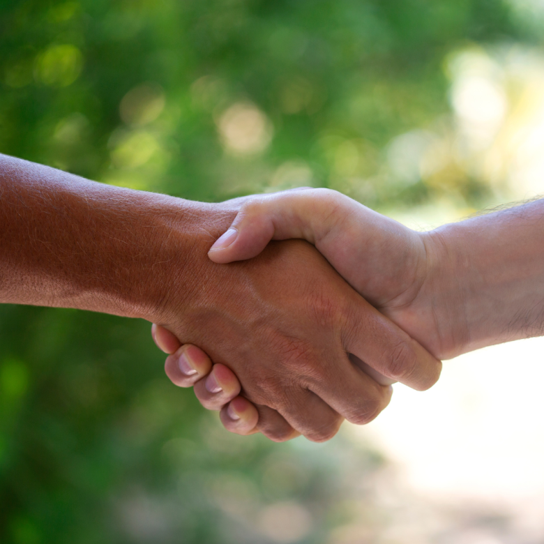 Two hands clasped